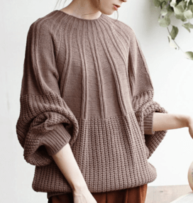 ミックスされた編み地の デザインニット